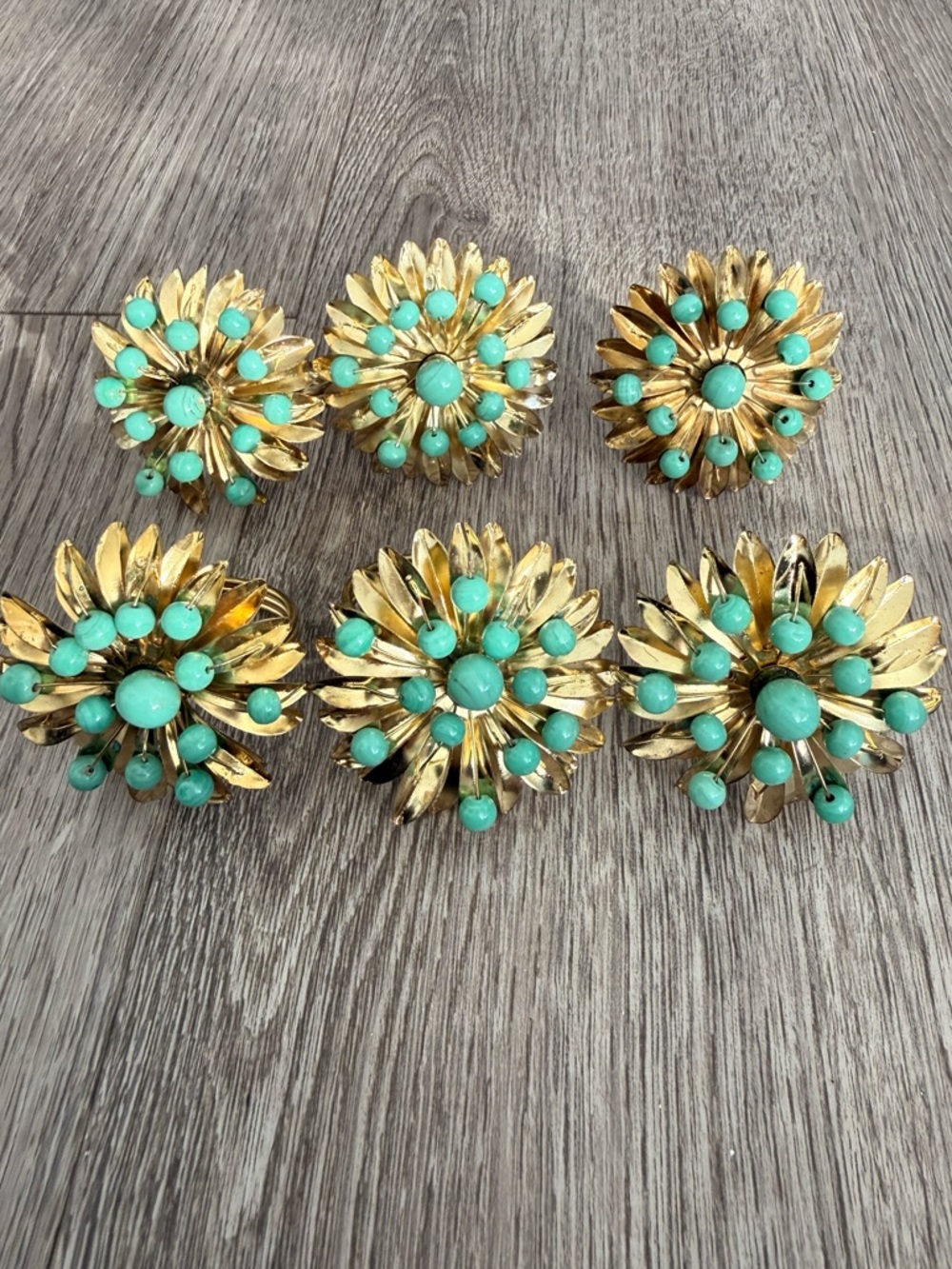 Vintage brass tone & turquoise napkin rings